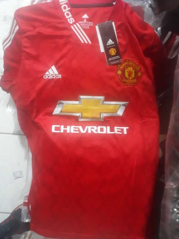 تيشرت منچستر قرمز يقه 3 خط اصل مردانه  - تصویر ۱